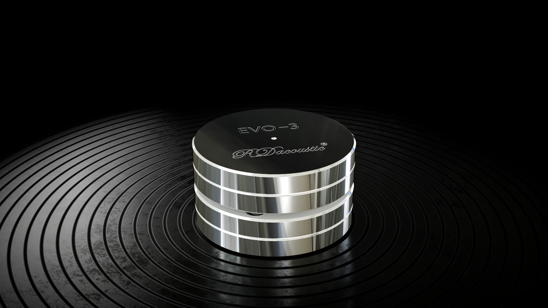 Srebrny izolator antywibracyjny EVO-3 marki RDacoustic na ciemnym tle z koncentrycznym wzorem, Gdańsk, Sopot, Gdynia, Trójmiasto.